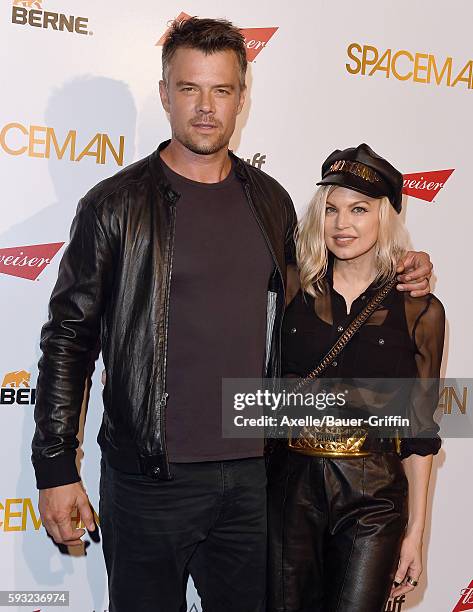Actor Josh Duhamel and wife singer Fergie arrive at the premiere of Orion Pictures' 'Spaceman' at The London Hotel on August 7, 2016 in West...