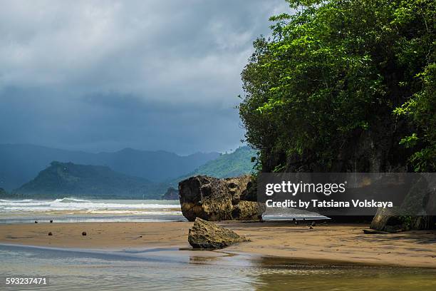 bay between the mountains and rocks - desert island stock pictures, royalty-free photos & images