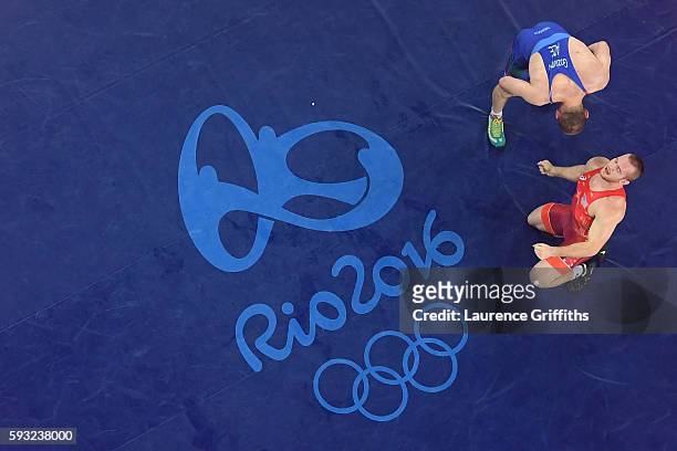 Kyle Frederick Snyder of the United States celebrates after winning gold over Khetag Goziumov of Azerbaijan during the Men's Freestyle 97kg Gold...