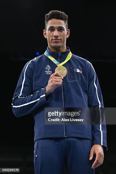 Gold medalist Tony Victor James Yoka of France poses on the podium during the medal ceremony for the Men's Boxing Super Heavy on Day 16 of the Rio...