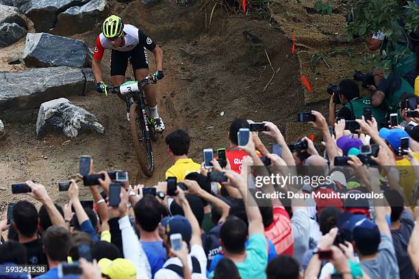 Nino Schurter of Switzerland rides during the Men's Cross-Country on Day 16 of the Rio 2016 Olympic Games at Mountain Bike Centre on August 21, 2016...