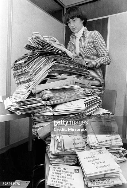 Office Girl counts the results of the Record Referendum, over 45,475 received at the offices of the Daily Record, Picture Published 18th November...