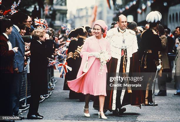 Queen Elizabeth II & Lord Mayor of London walk to Guildhall, for lunch, after Thanksgiving Service at St Pauls Cathedral, as part of HRH Silver...