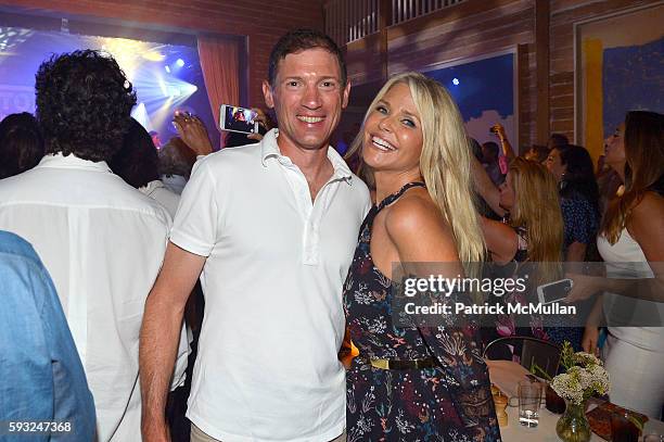 Glenn Fuhrman and Christie Brinkley attend the Apollo in the Hamptons 2016 party at The Creeks on August 20, 2016 in East Hampton, New York.