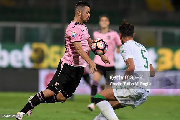 Ilija Nestorovski of Palermo holds off the challenge from Luca Antei of Sassuolo during the Serie A match between US Citta di Palermo and US Sassuolo...
