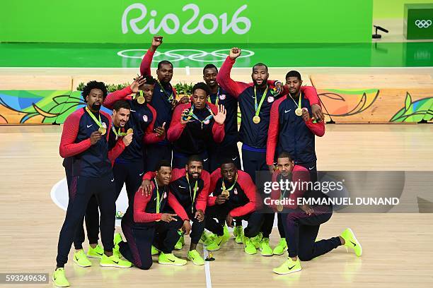 Gold medallists USA's forward Jimmy Butler, USA's guard Kevin Durant, USA's centre DeAndre Jordan, USA's guard Kyle Lowry, USA's forward Harrison...