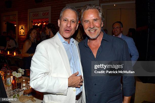 Eric Schneiderman and Don Johnson attend the Apollo in the Hamptons 2016 party at The Creeks on August 20, 2016 in East Hampton, New York.
