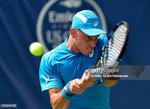 James Duckworth of Australia returns a shot to Petros Chrysochos of Cyprus during the Winston-Salem Open at Wake Forest University on August 21, 2016...