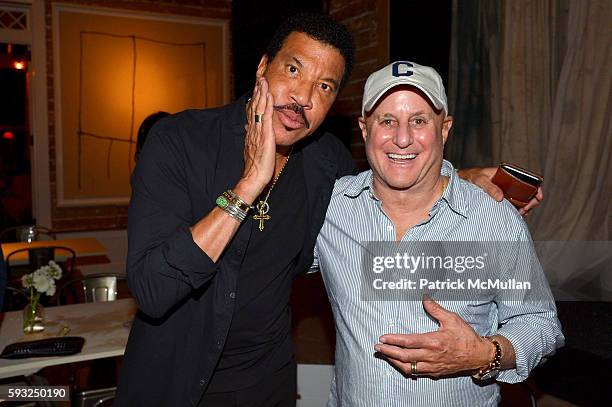 Lionel Richie and Ronald O. Perelman attend the Apollo in the Hamptons 2016 party at The Creeks on August 20, 2016 in East Hampton, New York.