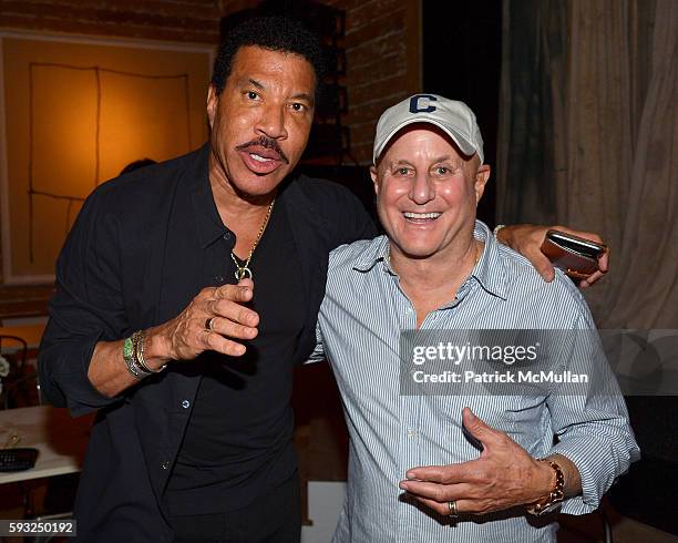 Lionel Richie and Ronald O. Perelman attend the Apollo in the Hamptons 2016 party at The Creeks on August 20, 2016 in East Hampton, New York.