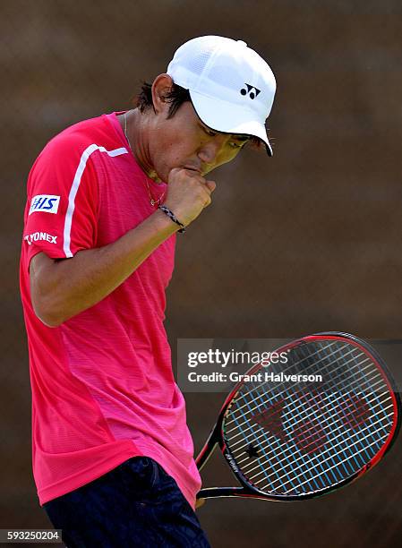 Yoshihito Nishioka of Japan reacts in his match against Liam Brody of Great Britain during the Winston-Salem Open at Wake Forest University on August...