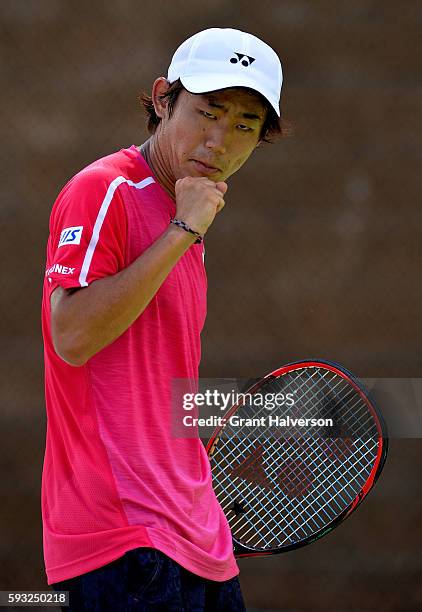 Yoshihito Nishioka of Japan reacts in his match against Liam Brody of Great Britain during the Winston-Salem Open at Wake Forest University on August...