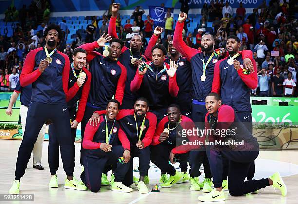 The United States team pose with their Gold medals after the final match of the Men's basketball between Serbia and United States on day 16 at...