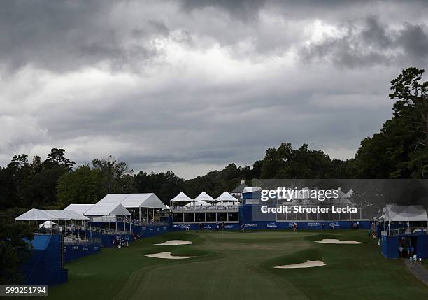 General view of the 18th hole in a rain delay during the final round of the Wyndham Championship at Sedgefield Country Club on August 21, 2016 in...