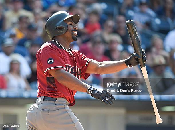 Michael Bourn of the Arizona Diamondbacks reacts after striking out during the eighth inning of a baseball game against the San Diego Padres at PETCO...