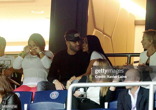 Aurah Ruiz kisses her boyfriend Jese Rodriguez of Paris Saint-Germain during the French Ligue 1 match between Paris Saint-Germain and FC Metz at Parc...