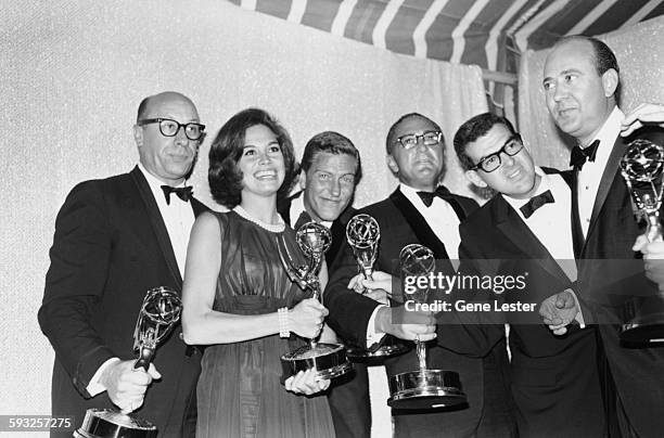 Some of the winners at the Emmy Awards holding their statuettes; Richard Deacon, Mary Tyler Moore, Dick Van Dyke, Sheldon Leonard and Carl Reiner,...