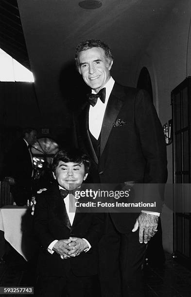 Mexican actor Ricardo Montalban and French actor Herve Villechaize, stars of 'Fantasy Island', at the Emmy Awards, California, September 8th 1979.
