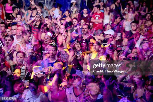 Festival goers enjoy a performance by Audien during the 2016 Billboard Hot 100 Festival - Day 2 at Nikon at Jones Beach Theater on August 21, 2016 in...