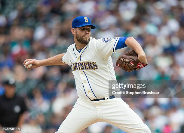 Tom Wilhelmsen of the Seattle Mariners delivers a pitch during the ninth inning of a game against the Milwaukee Brewers at Safeco Field on August 21,...