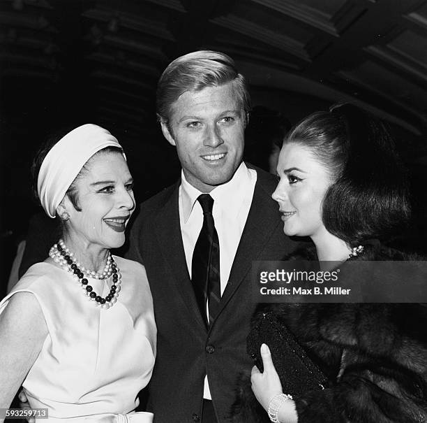 Actors Ruth Gordon, Robert Redford and Natalie Wood attending the nomination announcements for the Golden Globe Awards, 1966.