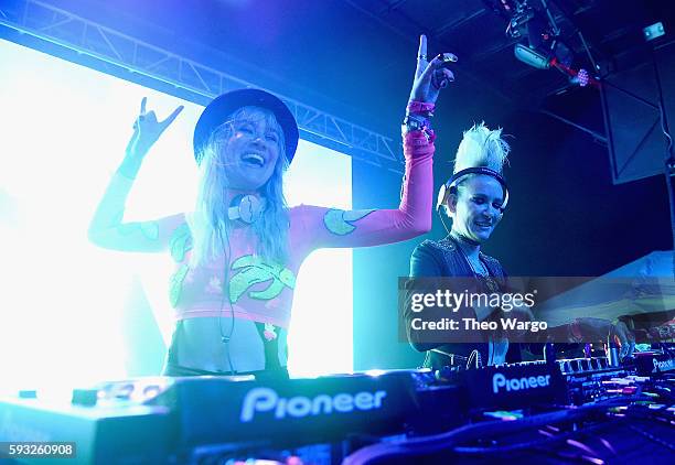Recording artists Olivia Nervo and Miriam Nervo of NERVO perform onstage during the 2016 Billboard Hot 100 Festival - Day 2 at Nikon at Jones Beach...