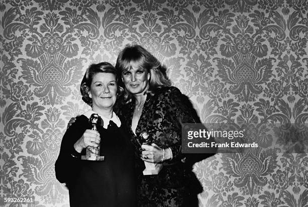 Actresses Barbara Bel Geddes and Linda Evans holding their awards at the Golden Globe Awards, at the Beverly Hilton Hotel, January 1982.