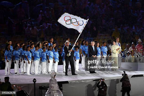 Mayor of Rio de Janeiro Eduardo Paes, IOC President Thomas Bach and Governor of Tokyo Yuriko Koike take part in the Flag Handover Ceremony during the...