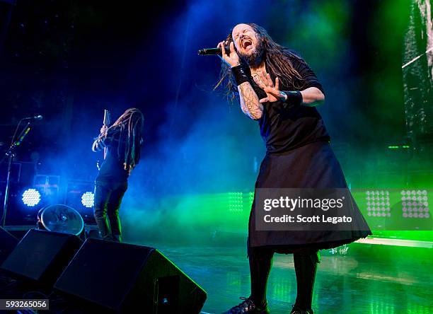 Brian "Head" Welch and Jonathan Davis of KORN perform at DTE Energy Music Theater on August 21, 2016 in Clarkston, Michigan.