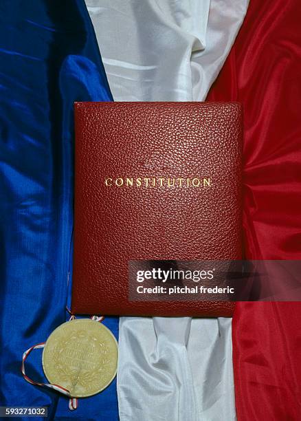 Original text of the Constitution from the 5th French Republic approved by referendum in 1958 and housed at the Chancellery in Paris, alongside an...