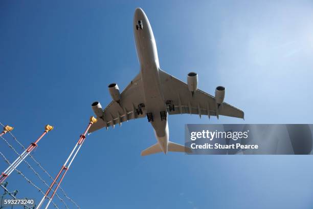 airbus a380 in flight - lufthansa stock pictures, royalty-free photos & images