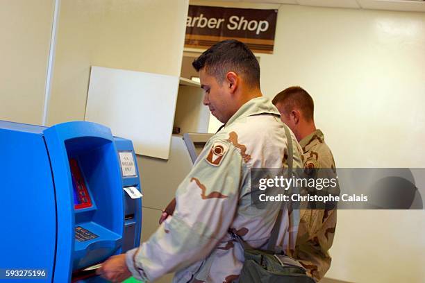 Camp As Saliyah. U.S. Soldiers withdrawing money at the American Military Central Command , near Doha. As Saliyah is the U.S. Army's largest...