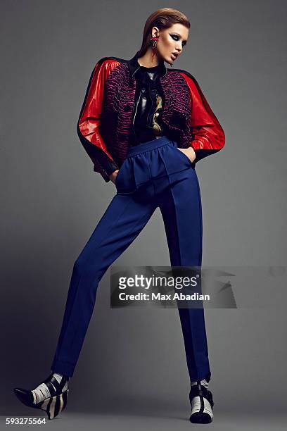 Elizabeth Cabral; Makeup: Hung Vanngo; Hair: Keith Carpenter; Manicure: Alicia Torello. Jacket, top, pants, earrings, and shoes all by Balenciaga by...