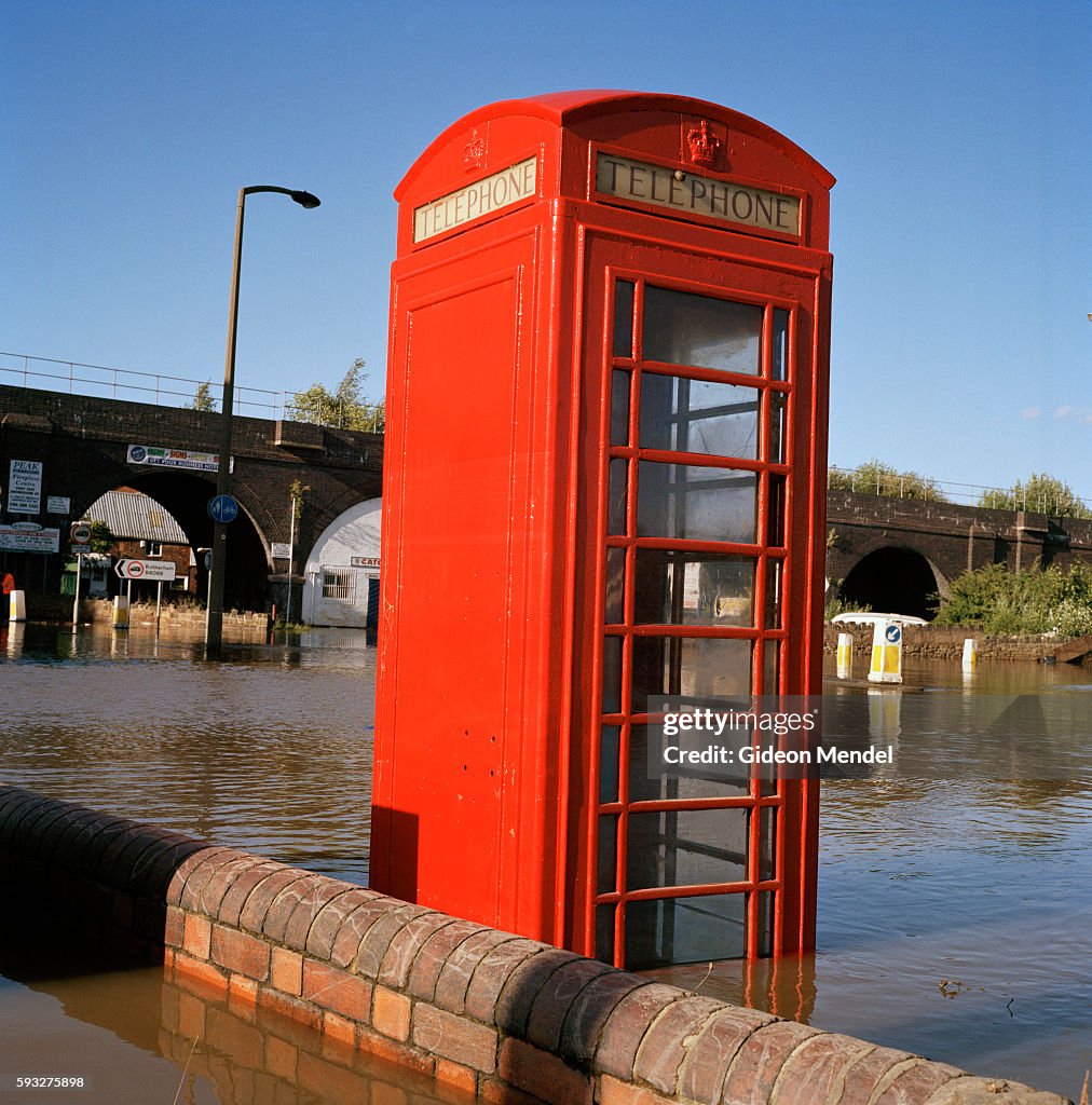 UK - Floods - Telephone box in floodwaters