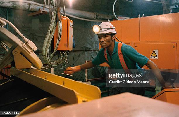 Eric Morake, a winch operator at work in Great Noligwa gold mine. He is one of the estimated 30% of South African goldminers diagnosed as HIV...