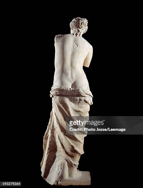 The Venus de Milo - Detail of a marble sculpture of Aphrodite. 100 BC. 2,02 m. Coming from the island of Milos in Greece. Louvre Museum, Paris