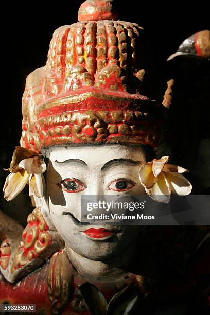 Statue of Shiva depicted as God and protector of sailors and fishermen at the Pura Semawang temple on Sanur beach.