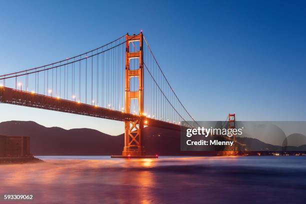 golden gate bridge twilight san francisco california - golden gate bridge construction stock pictures, royalty-free photos & images