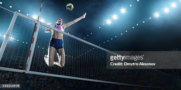 voleibol: jugadora femenina en acción - juego de vóleibol fotografías e imágenes de stock