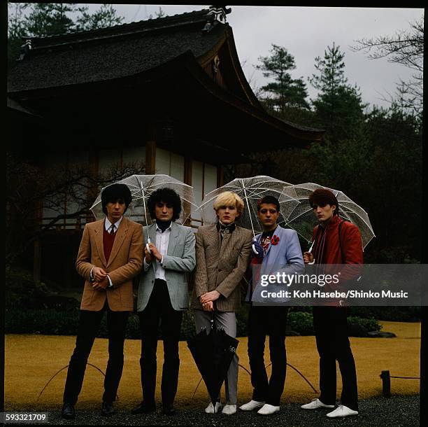 Japan photo session in front of Okochi mountain villa in rainy Arashiyama Kyoto, Kyoto, February 1981.