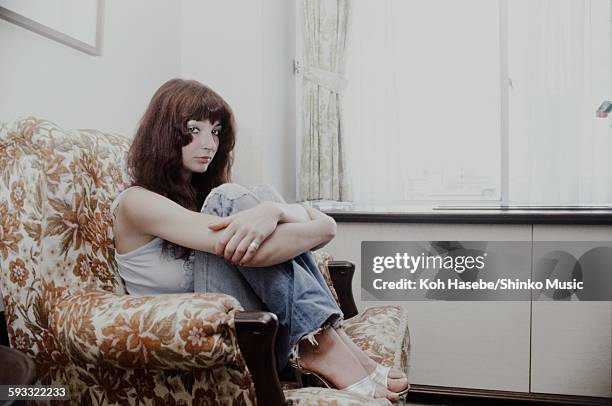 Kate Bush relaxing in a hotel room, Tokyo, June 1978.