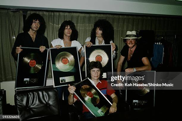 Rainbow presented gold disc for 'Difficult to Cure', Tokyo, August 1981.