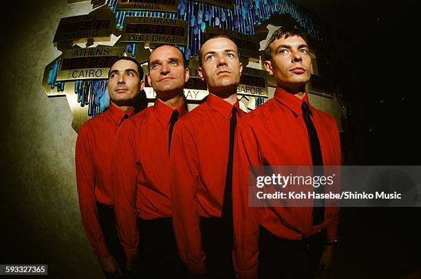 Kraftwerk in front of world time clock in Keio Plaza Hotel, Tokyo, September 1981.