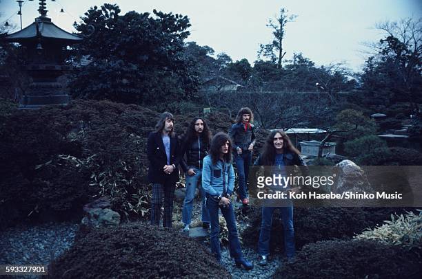Uriah Heep group shot in Japanese hotel garden, Tokyo, March 1973.