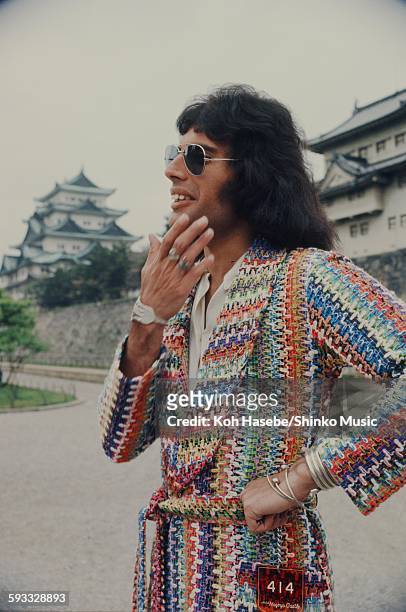 Freddie Mercury against the Nagoya Castle, Nagoya, April 22, 1975.