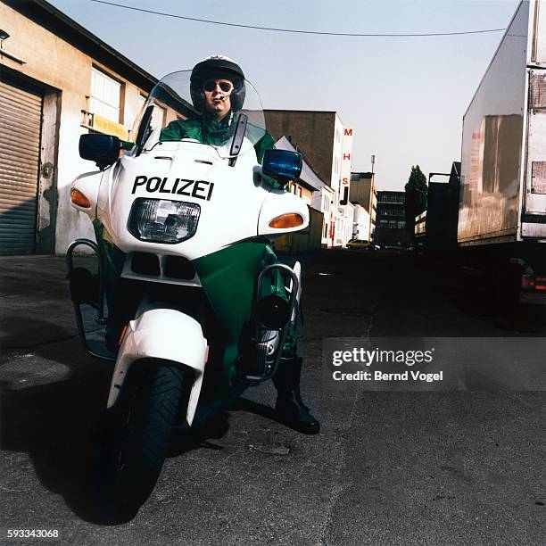 policeman on motorcycle - bike headset stock-fotos und bilder