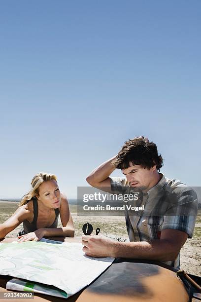 Confused Compass Photos and Premium High Res Pictures - Getty Images