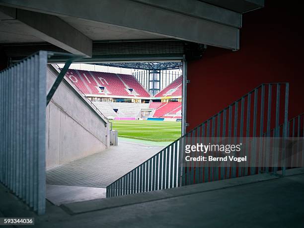 players entrance to soccer field - empty stadium stockfoto's en -beelden