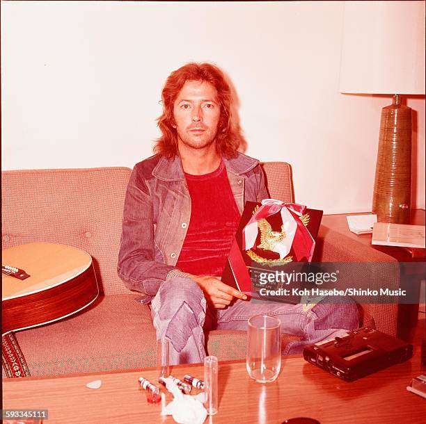 Eric Clapton holding shield for ML popularity vote, Tokyo, November 1975.