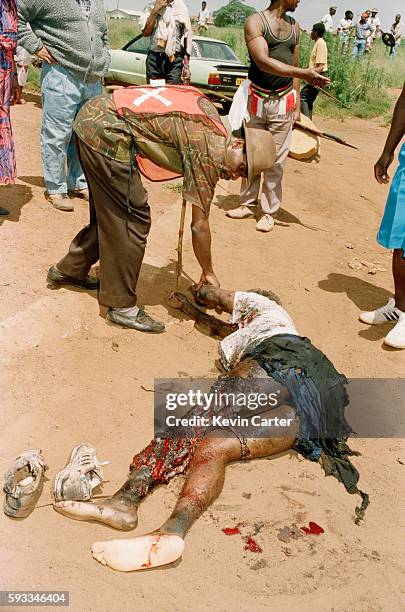 Grenade attack during a funeral for an Inkatha Freedom Party member. The attack was committed by members of the Azanian People's Organisation .